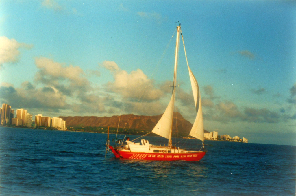 Mai Miti Vavau sailing out of Honolulu, with Diamond Head Crater in the background. 